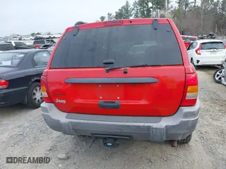 1999 Jeep Grand Cherokee Laredo with VIN 1J4GW58S0XC519908, listed as a IAAI auction lot 41789905 with 221,064 mi miles. Bid and sale history available at carsss.com. Image 17.