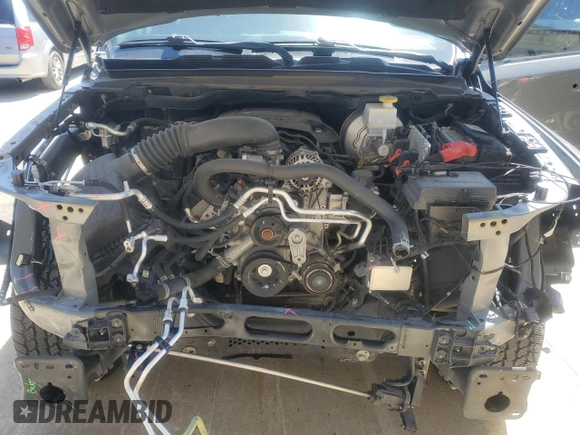 2020 Ram 1500 Big Horn z VIN 1C6SRFFT9LN379629, wystawiony jako Copart lot #51930605 z przebiegiem 71 697 mil mil oraz Szkoda całkowita • Salvage title. Historia ofert i sprzedaży dostępna na DreamBid. Obrazek 11.