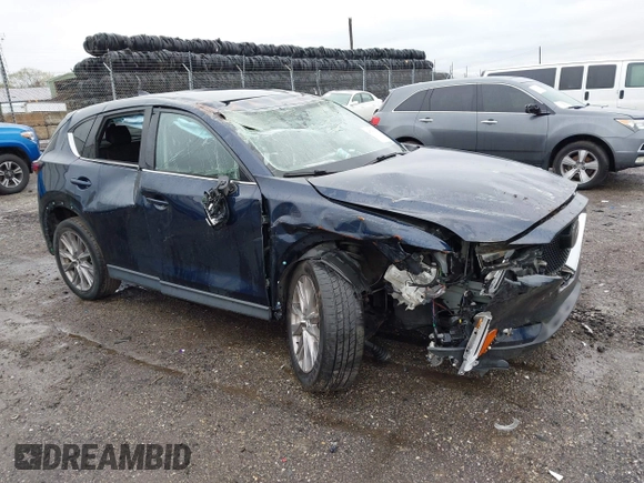 2019 Mazda CX-5 Grand Touring with VIN JM3KFBDM6K0592496, listed as a IAAI auction lot 41730103 with Not Provided miles and . Bid and sale history available at carsss.com. Image 1.