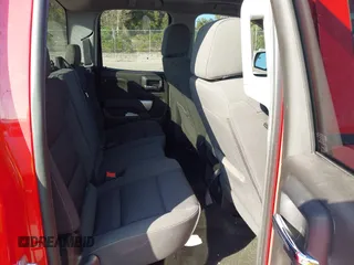 2018 Chevrolet Silverado 1500 LT with VIN 1GCRCREC1JZ170659, listed as a IAAI auction lot 41522588 with 129,412 mi miles and . Bid and sale history available at DreamBid. Image 8.