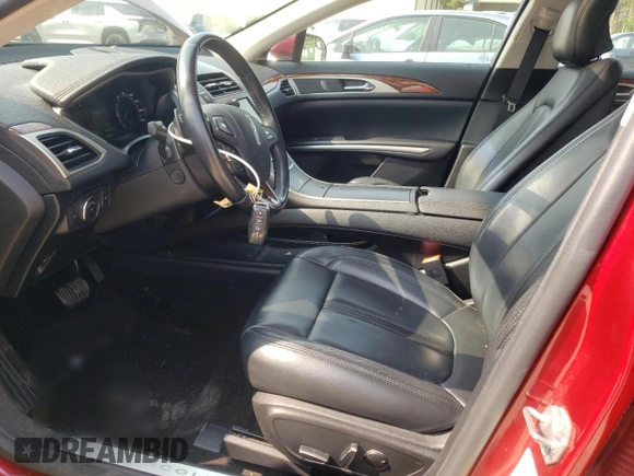 2015 Lincoln MKZ z VIN 3LN6L2GK2FR603783, wystawiony jako Copart lot #60038835 z przebiegiem 66 820 mil mil oraz Szkoda całkowita • Salvage title. Historia ofert i sprzedaży dostępna na DreamBid. Obrazek 7.