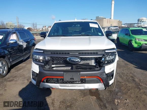 2024 Ford Expedition Timberline with VIN 1FMJU1RG1REB10629, listed as a IAAI auction lot 41974714 with 1,232 mi miles and . Bid and sale history available at DreamBid. Image 12.
