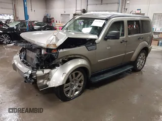 2007 Dodge Nitro SLT z VIN 1D8GU58K57W673543, wystawiony jako IAAI lot #41574634 z przebiegiem 64 286 mil mil oraz . Historia ofert i sprzedaży dostępna na DreamBid. Obrazek 18.