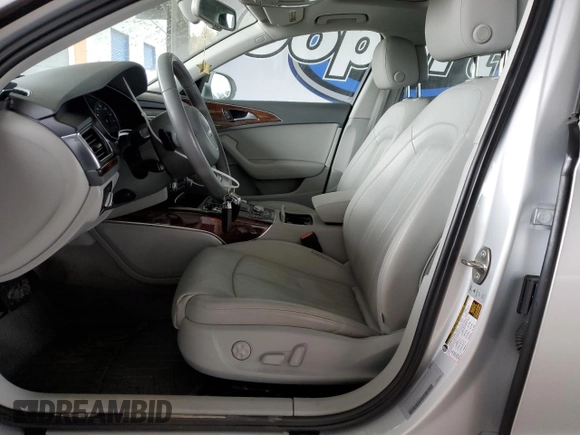 2014 Audi A6 Prestige z VIN WAUHGAFC1EN143102, wystawiony jako Copart lot #53692145 z przebiegiem 101 503 mil mil oraz Szkoda całkowita • Salvage title. Historia ofert i sprzedaży dostępna na DreamBid. Obrazek 7.