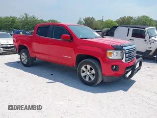 2018 GMC Canyon 2WD SLE z VIN 1GTG5CEA2J1183495, wystawiony jako IAAI lot #42026777 z przebiegiem 82 256 mil mil oraz . Historia ofert i sprzedaży dostępna na DreamBid. Obrazek 1.