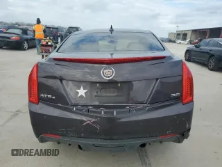 2014 Cadillac ATS Luxury AWD z VIN 1G6AH5R37E0144887, wystawiony jako Copart lot #86176144 z przebiegiem Nie podano mil oraz Szkoda całkowita • Salvage title. Historia ofert i sprzedaży dostępna na DreamBid. Obrazek 6.