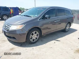 2012 Honda Odyssey EX with VIN 5FNRL5H41CB011940, listed as a IAAI auction lot 42033966 with 182,996 mi miles and . Bid and sale history available at DreamBid. Image 17.