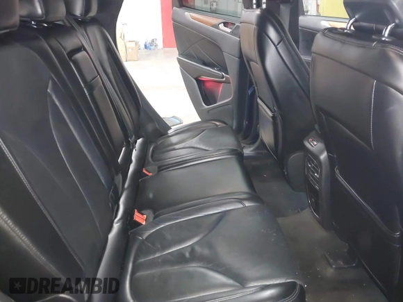 2015 Lincoln MKC with VIN 5LMTJ2AH0FUJ28744, listed as a IAAI auction lot 41888775 with 145,872 mi miles. Bid and sale history available at carsss.com. Image 8.