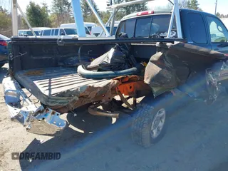 2000 Toyota Tundra Limited with VIN 5TBBT4815YS065867, listed as a IAAI auction lot 41995501 with 208,889 mi miles. Bid and sale history available at carsss.com. Image 6.