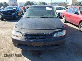 2000 Honda Accord EX z VIN JHMCG6672YC033056, wystawiony jako IAAI lot #41866960 z przebiegiem 217 289 mil mil oraz . Historia ofert i sprzedaży dostępna na DreamBid. Obrazek 6.