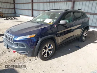 2015 Jeep Cherokee Trailhawk with VIN 1C4PJMBB1FW520649, listed as a IAAI auction lot 41991904 with 168,533 mi miles and . Bid and sale history available at DreamBid. Image 2.