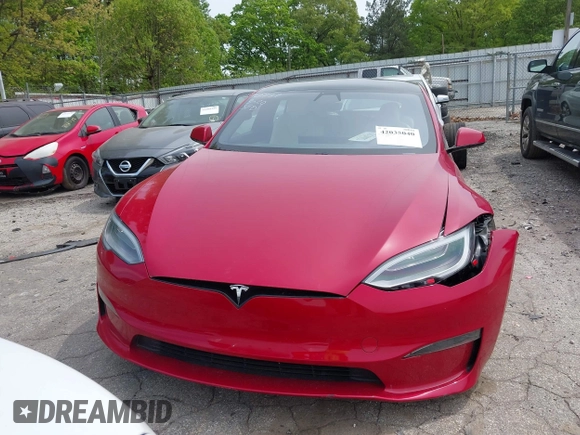 2022 Tesla Model S with VIN 5YJSA1E58NF470737, listed as a IAAI auction lot 42035040 with 15,224 mi miles and . Bid and sale history available at DreamBid. Image 12.