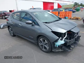 2018 Nissan LEAF SV z VIN 1N4AZ1CP2JC315574, wystawiony jako IAAI lot #42283688 z przebiegiem 54 640 mil mil oraz . Historia ofert i sprzedaży dostępna na DreamBid. Obrazek 1.