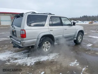 1998 Toyota 4Runner Limited with VIN JT3HN87RXW0144093, listed as a IAAI auction lot 41520901 with 205,623 mi miles. Bid and sale history available at carsss.com. Image 4.