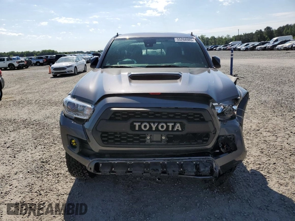 2022 Toyota Tacoma SR z VIN 3TYCZ5AN8NT076536, wystawiony jako Copart lot #55268985 z przebiegiem 57 697 mil mil oraz Szkoda całkowita • Salvage title. Historia ofert i sprzedaży dostępna na DreamBid. Obrazek 5.