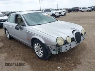 2001 Jaguar S-Type with VIN SAJDA01P91GM04421, listed as a IAAI auction lot 41676230 with 139,403 mi miles and . Bid and sale history available at DreamBid. Image 1.