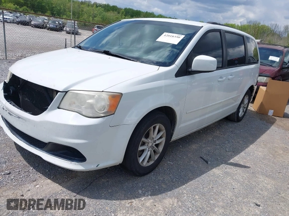 2014 Dodge Grand Caravan SXT with VIN 2C4RDGCG8ER264027, listed as a IAAI auction lot 42018350 with 311,876 mi miles and . Bid and sale history available at DreamBid. Image 2.