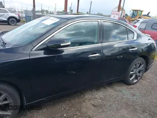 2014 Nissan Maxima S with VIN 1N4AA5AP9EC908498, listed as a IAAI auction lot 41945171 with 130,090 mi miles and . Bid and sale history available at DreamBid. Image 15.