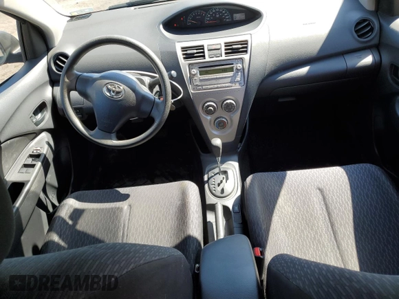 2012 Toyota Yaris with VIN JTDBT4K36CL028550, listed as a Copart auction lot 52071475 with 173,922 mi miles and Salvage Title. Bid and sale history available at DreamBid. Image 8.