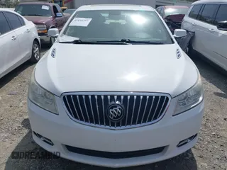 2013 Buick LaCrosse Premium 1 z VIN 1G4GF5E32DF268639, wystawiony jako IAAI lot #41934122 z przebiegiem 176 276 mil mil oraz . Historia ofert i sprzedaży dostępna na DreamBid. Obrazek 12.