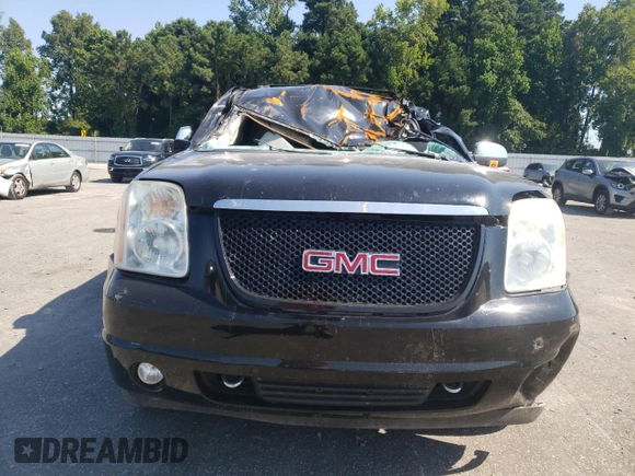 2010 GMC Yukon SLT with VIN 1GKUCCE04AR285385, listed as a Copart auction lot 67070084 with 166,401 mi miles and Salvage Title. Bid and sale history available at carsss.com. Image 5.
