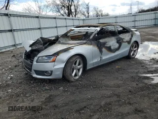 2009 Audi A5 with VIN WAUDK78T09A001754, listed as a Copart auction lot 50574115 with 0 mi miles and Salvage Title. Bid and sale history available at carsss.com. Image 1.