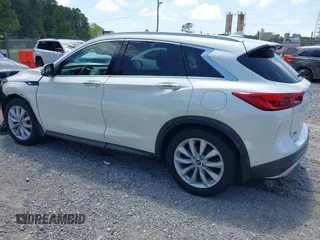 2019 Infiniti QX50 Essential with VIN 3PCAJ5M35KF125258, listed as a IAAI auction lot 42267473 with 53,563 mi miles and . Bid and sale history available at DreamBid. Image 3.