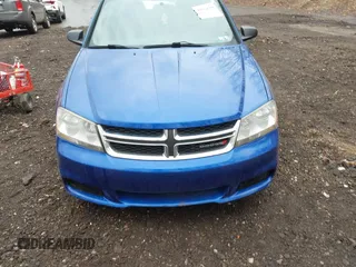 2013 Dodge Avenger SE with VIN 1C3CDZAB4DN628596, listed as a IAAI auction lot 41904599 with 56,791 mi miles and . Bid and sale history available at DreamBid. Image 15.