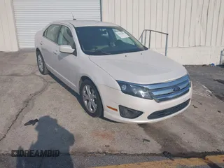 2012 Ford Fusion SE z VIN 3FAHP0HA4CR389358, wystawiony jako IAAI lot #42252862 z przebiegiem 208 097 mil mil oraz . Historia ofert i sprzedaży dostępna na DreamBid. Obrazek 1.