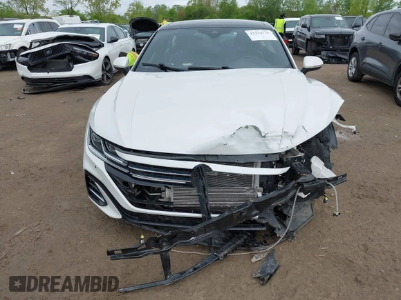 2021 Volkswagen Arteon SEL R-Line z VIN WVWSR7AN6ME007156, wystawiony jako IAAI lot #42254735 z przebiegiem 32 004 mil mil oraz . Historia ofert i sprzedaży dostępna na DreamBid. Obrazek 13.