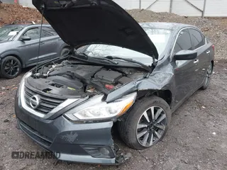 2018 Nissan Altima SV with VIN 1N4AL3AP3JC205875, listed as a IAAI auction lot 41892855 with 159,630 mi miles and . Bid and sale history available at DreamBid. Image 6.