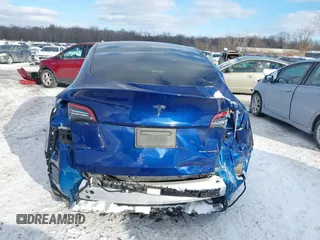 2021 Tesla Model Y Long Range with VIN 5YJYGDEE1MF083780, listed as a IAAI auction lot 41549308 with 37,372 mi miles and . Bid and sale history available at DreamBid. Image 17.