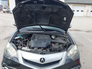 2010 Acura RDX Tech Pkg with VIN 5J8TB1H59AA007779, listed as a IAAI auction lot 41894049 with 198,735 mi miles. Bid and sale history available at carsss.com. Image 10.