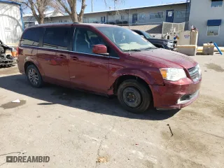 2018 Dodge Grand Caravan SXT with VIN 2C4RDGCG6JR179407, listed as a Copart auction lot 45552795 with 135,386 mi miles and Salvage Title. Bid and sale history available at carsss.com. Image 4.