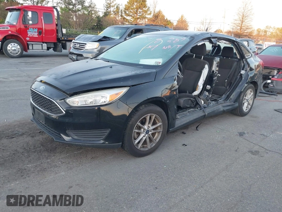 2017 Ford Focus SE with VIN 1FADP3FE7HL298287, listed as a IAAI auction lot 41870698 with Not Provided miles and . Bid and sale history available at carsss.com. Image 16.