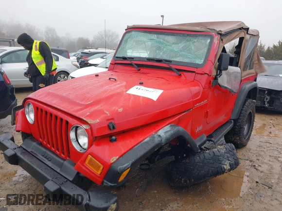 2000 Jeep Wrangler SE with VIN 1J4FA29P7YP793068, listed as a IAAI auction lot 41576287 with 113,298 mi miles. Bid and sale history available at carsss.com. Image 2.