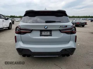 2022 BMW X3 M z VIN 5YM13EC02N9J64591, wystawiony jako Copart lot #62077833 z przebiegiem 24 808 mil mil oraz . Historia ofert i sprzedaży dostępna na DreamBid. Obrazek 6.