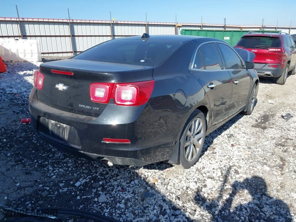 2013 Chevrolet Malibu LTZ with VIN 1G11H5SA6DF217077, listed as a IAAI auction lot 41779449 with 150,412 mi miles. Bid and sale history available at carsss.com. Image 4.