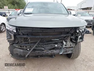 2023 Chevrolet Suburban Premier z VIN 1GNSCFKD8PR362870, wystawiony jako IAAI lot #42148476 z przebiegiem 54 983 mil mil oraz . Historia ofert i sprzedaży dostępna na DreamBid. Obrazek 13.