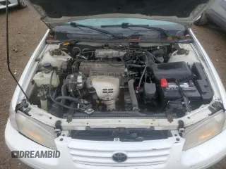 1999 Toyota Camry LE z VIN 4T1BG22K4XU485515, wystawiony jako Copart lot #55110155 z przebiegiem 230 079 mil mil oraz Czysty tytuł • Clean title. Historia ofert i sprzedaży dostępna na DreamBid. Obrazek 11.