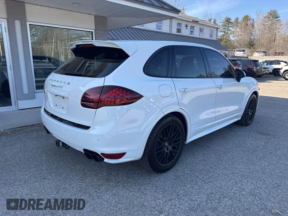 2013 Porsche Cayenne GTS with VIN WP1AD2A22DLA78738, listed as a IAAI auction lot 41816214 with 155,455 mi miles and . Bid and sale history available at DreamBid. Image 4.