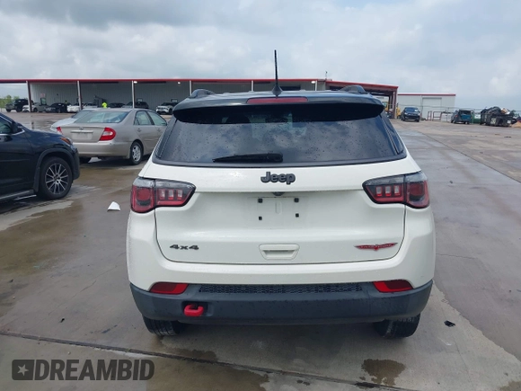2020 Jeep Compass Trailhawk with VIN 3C4NJDDB3LT118928, listed as a IAAI auction lot 42128120 with 95,477 mi miles and . Bid and sale history available at DreamBid. Image 16.
