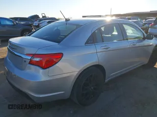 2012 Chrysler 200 S with VIN 1C3CCBHGXCN188538, listed as a IAAI auction lot 41085313 with 107,002 mi miles and . Bid and sale history available at DreamBid. Image 4.