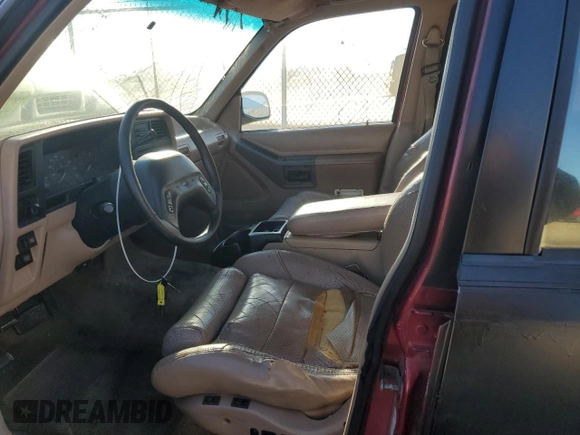 1993 Ford Explorer Eddie Bauer with VIN 1FMDU34X6PUA93264, listed as a Copart auction lot 82560544 with 21,822 mi miles and Salvage title. Bid and sale history available at DreamBid. Image 7.