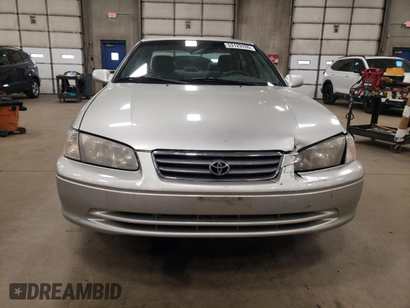2000 Toyota Camry CE z VIN JT2BG22K1Y0483646, wystawiony jako Copart lot #53129705 z przebiegiem 187 418 mil mil oraz Szkoda całkowita • Salvage title. Historia ofert i sprzedaży dostępna na DreamBid. Obrazek 5.