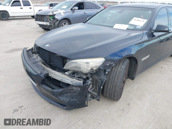2012 BMW 7 Series 750Li with VIN WBAKB8C50CC963330, listed as a IAAI auction lot 41286275 with 186,335 mi miles. Bid and sale history available at carsss.com. Image 6.