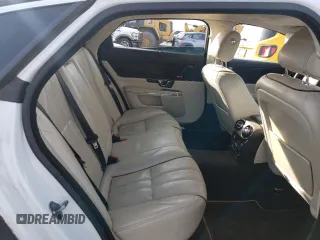 2014 Jaguar XJ with VIN SAJWA2GZ7E8V69543, listed as a Copart auction lot 86390204 with 110,929 mi miles and Salvage Title. Bid and sale history available at carsss.com. Image 10.
