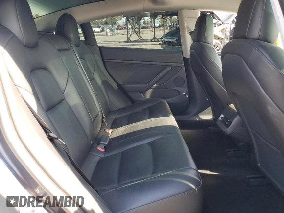 2023 Tesla Model 3 с VIN 5YJ3E1EA9PF412192, выставлен на аукционе Copart как лот 52122045 с пробегом 72 230 миль миль и Списание • Salvage title. История ставок и продаж доступна на DreamBid. Изображение 10.