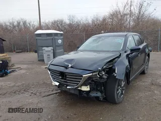 2021 Mazda CX-9 Touring z VIN JM3TCBCY4M0520362, wystawiony jako IAAI lot #41193396 z przebiegiem 17 323 mil mil oraz . Historia ofert i sprzedaży dostępna na DreamBid. Obrazek 6.