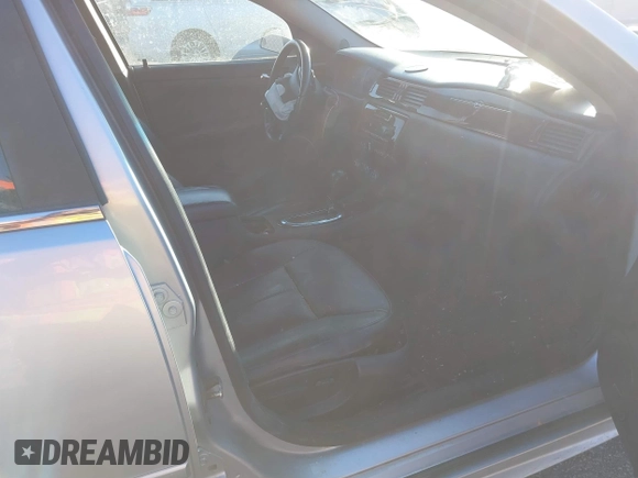 2013 Chevrolet Impala LTZ with VIN 2G1WC5E31D1190461, listed as a IAAI auction lot 41381242 with 205,833 mi miles and . Bid and sale history available at DreamBid. Image 5.